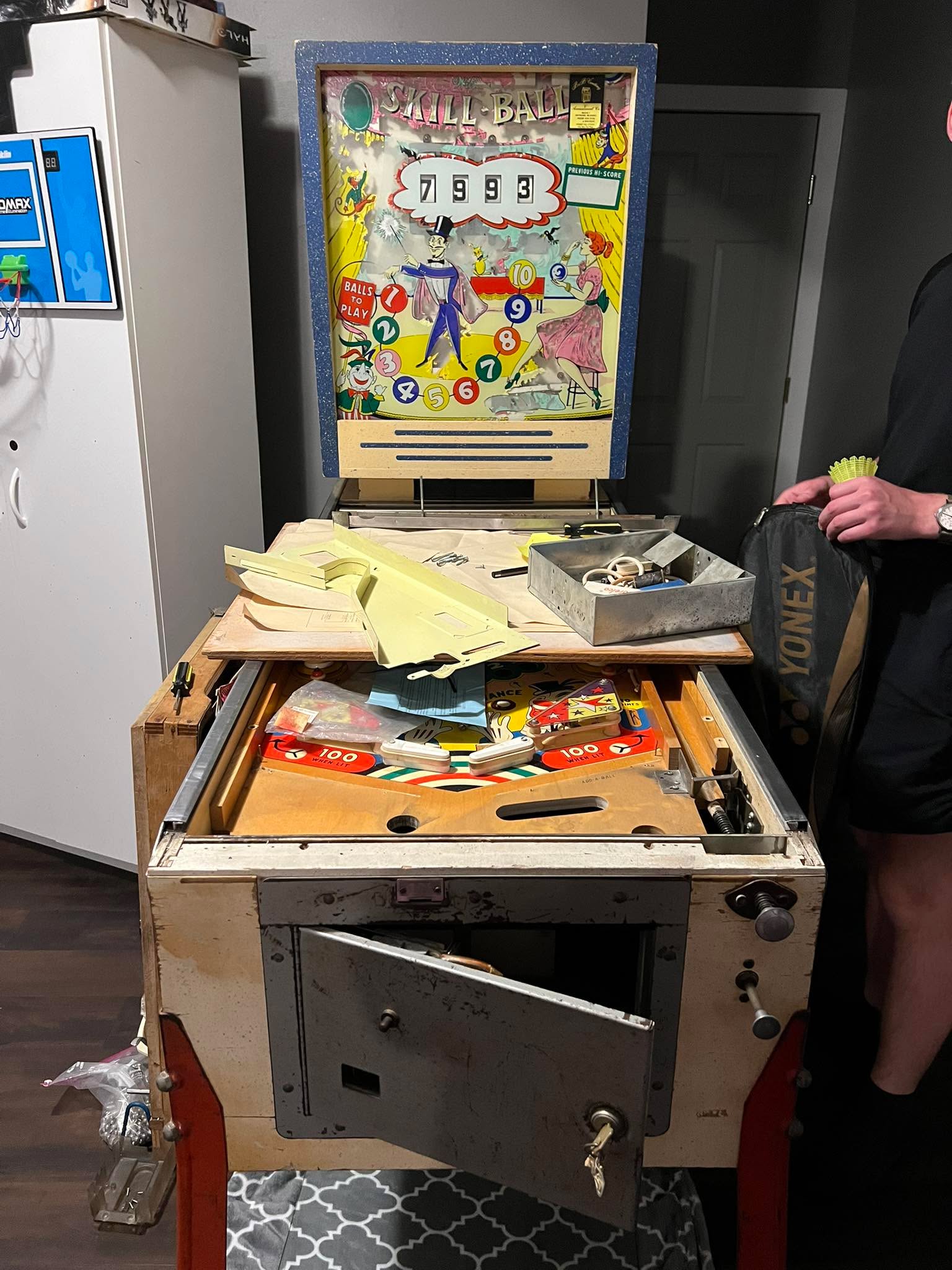 Does anybody have a recommendation on somebody who would know how to fix an antique pinball machine? 